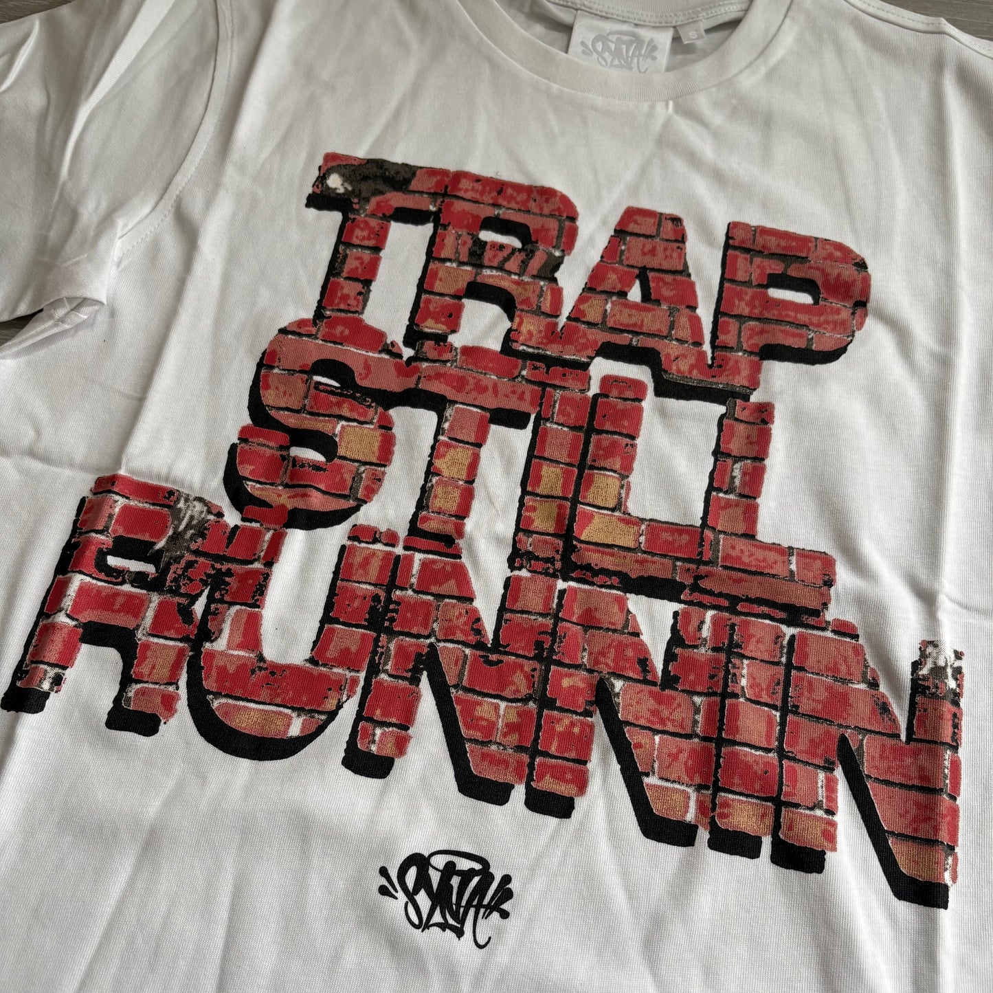 Syna World T-shirt